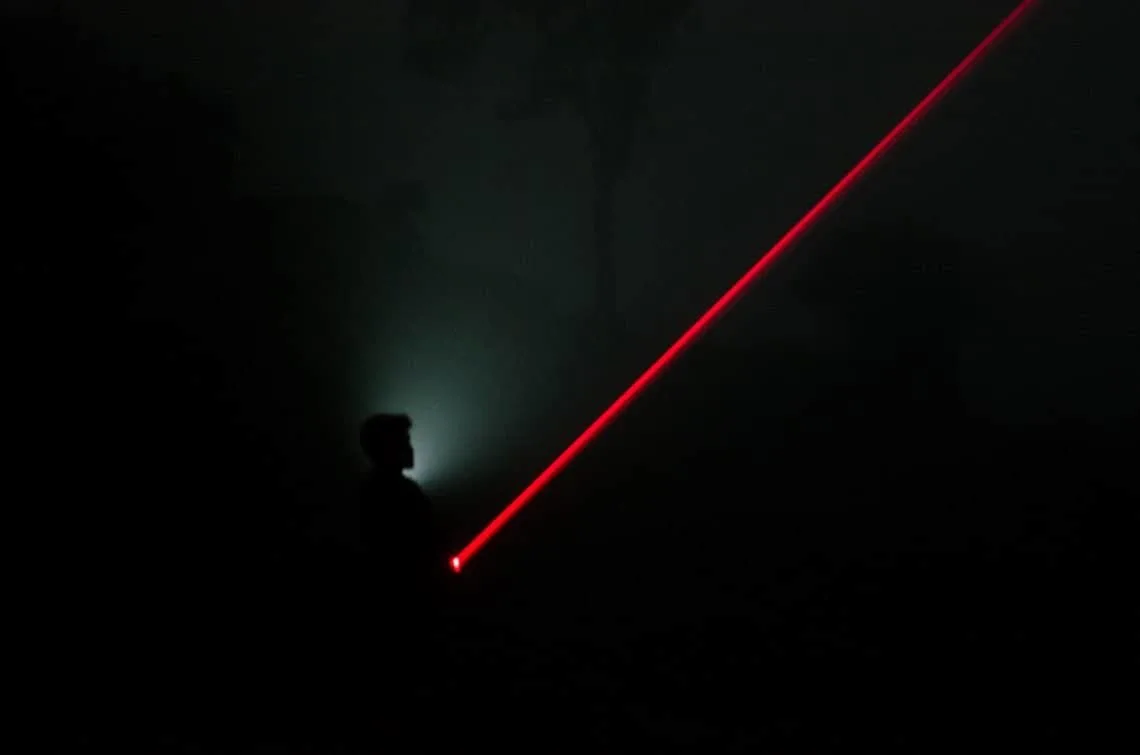 Laser pointer in the dark.