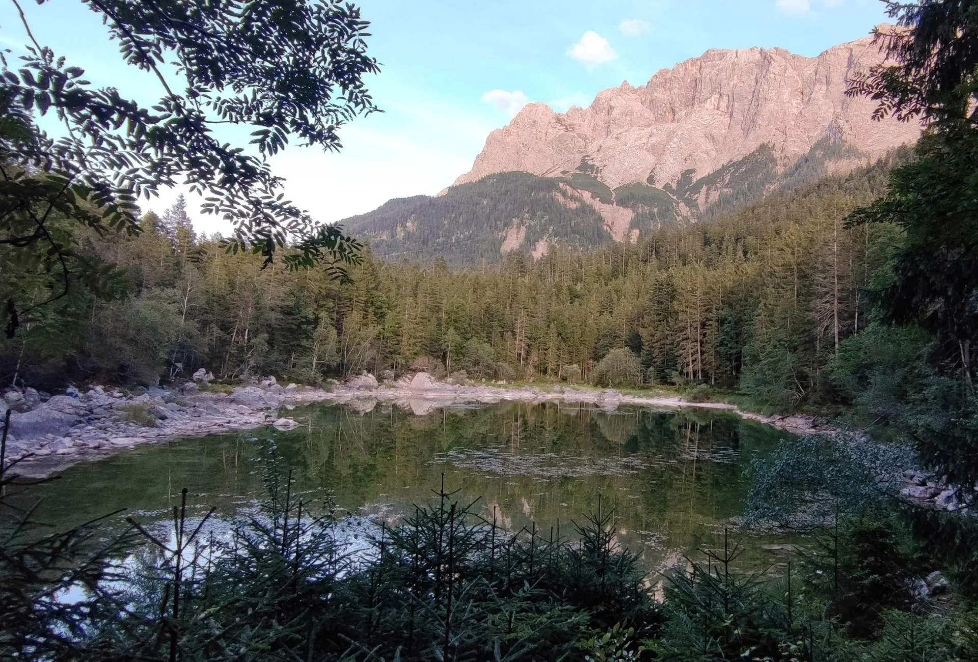 Mountain lake Frillensee, right next to the Eibsee with the Zugspitze visible in the background, taken in summer.