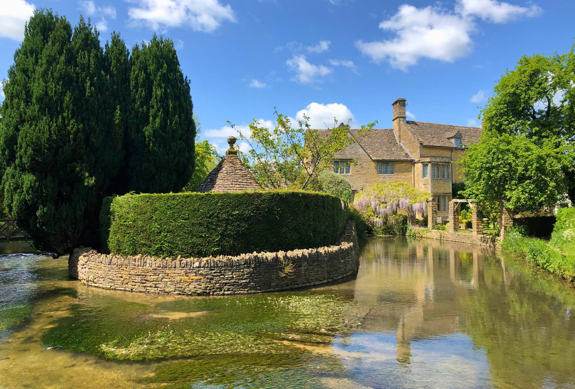 Large house by a pond in Bourton on the Water.