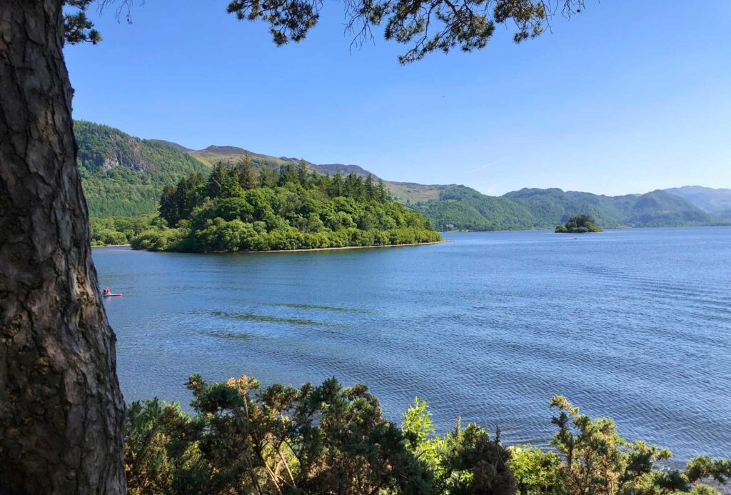 View of Derwentwaret with a small island surrounded by water.